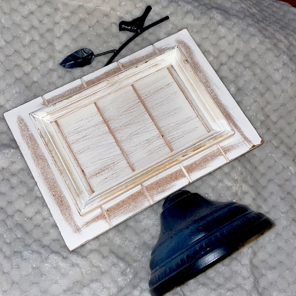 Wooden picture frame worn metal bottom